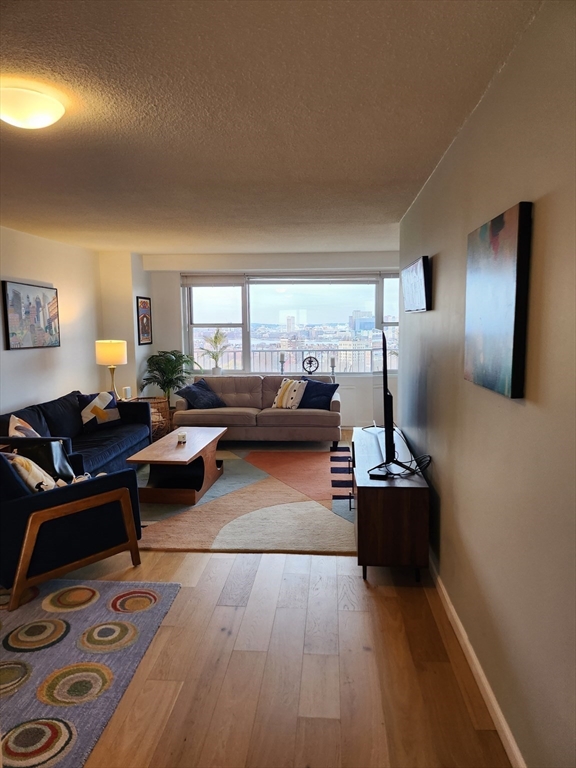 1BR Condo w/ Balcony, Garage, & City Views in Downtown, Boston