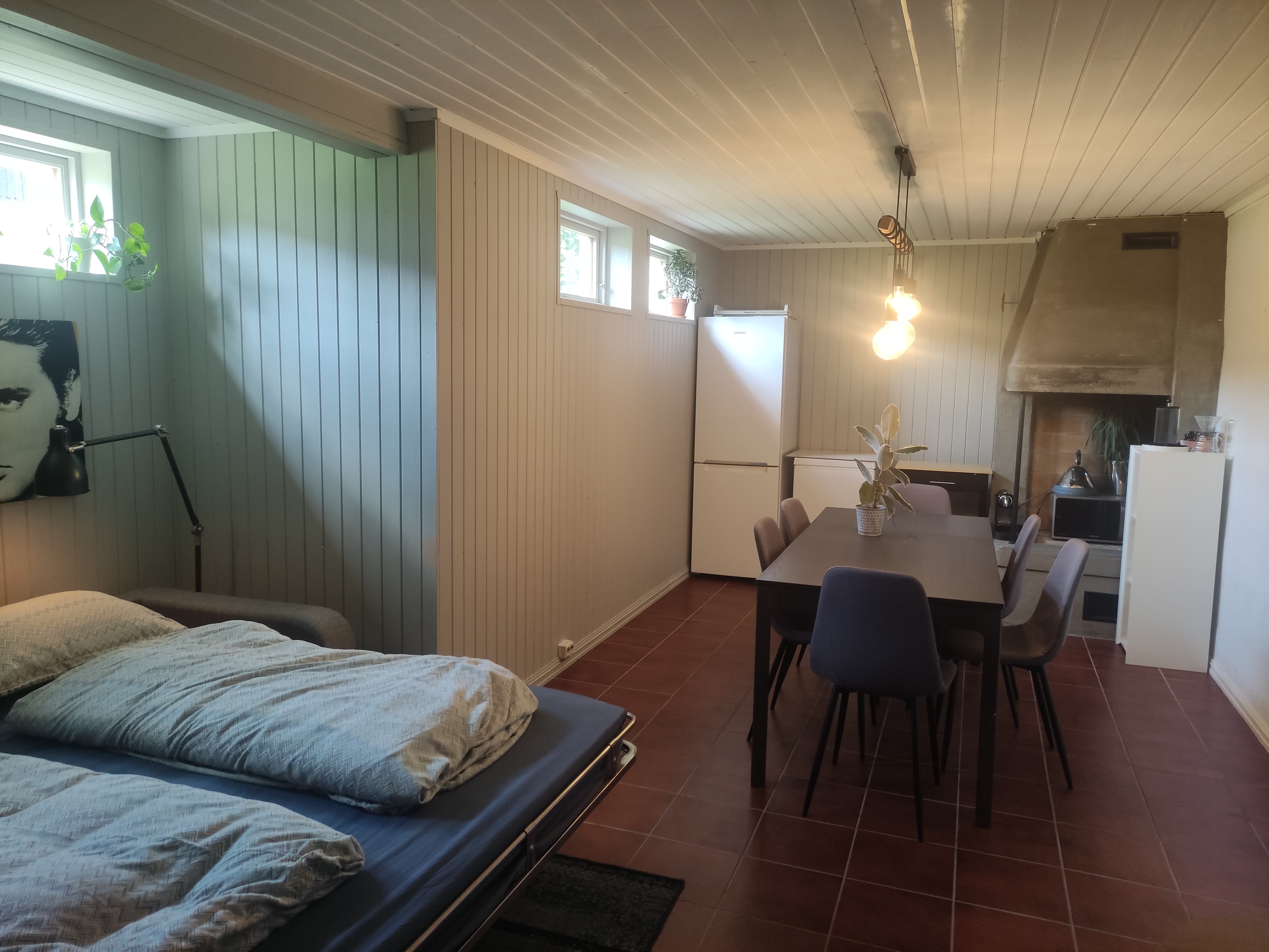 Basement living room with bedroom and bathroom.