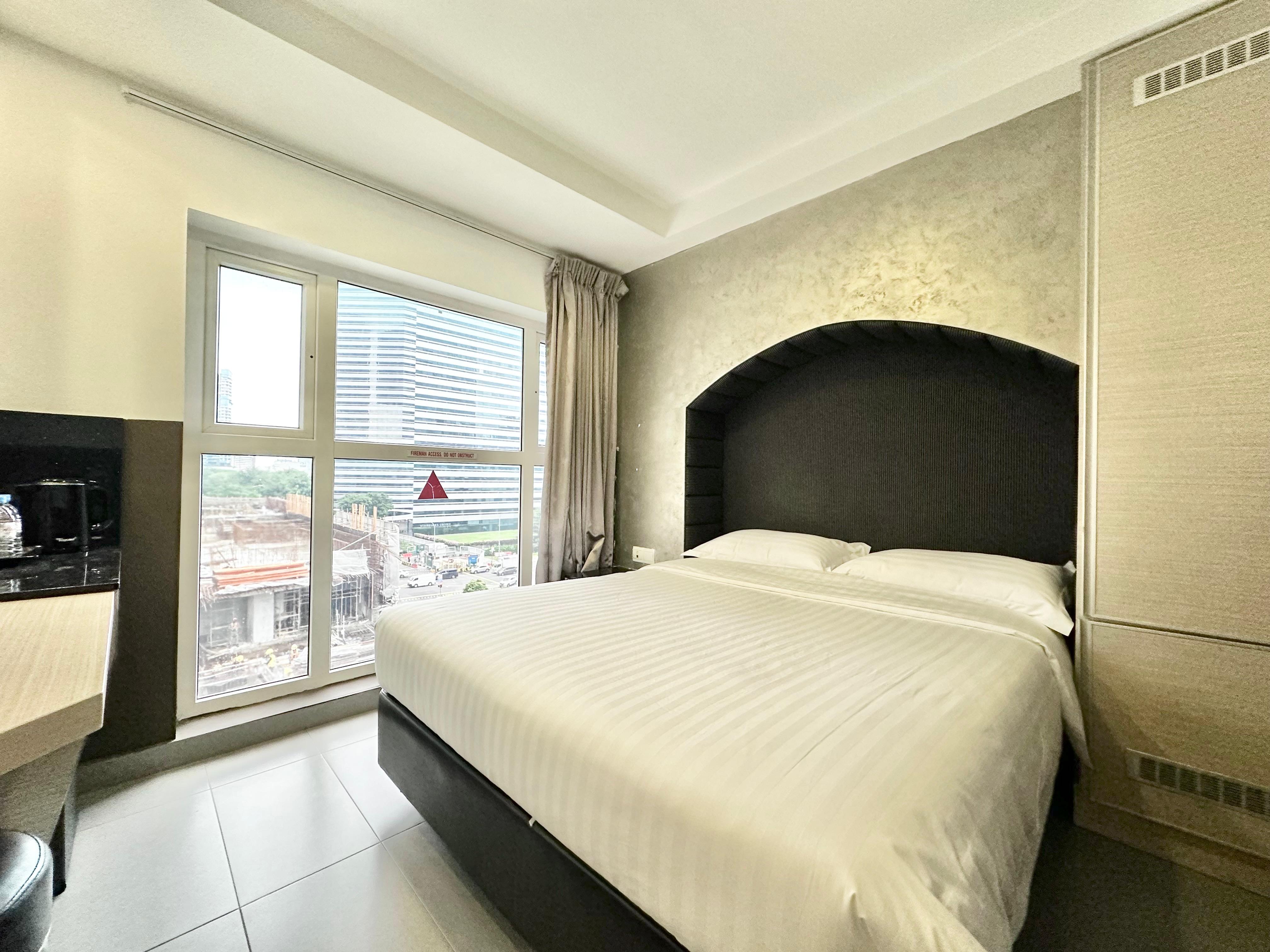 Snooze Exec Queen - 2 minutes away from BUGIS MRT