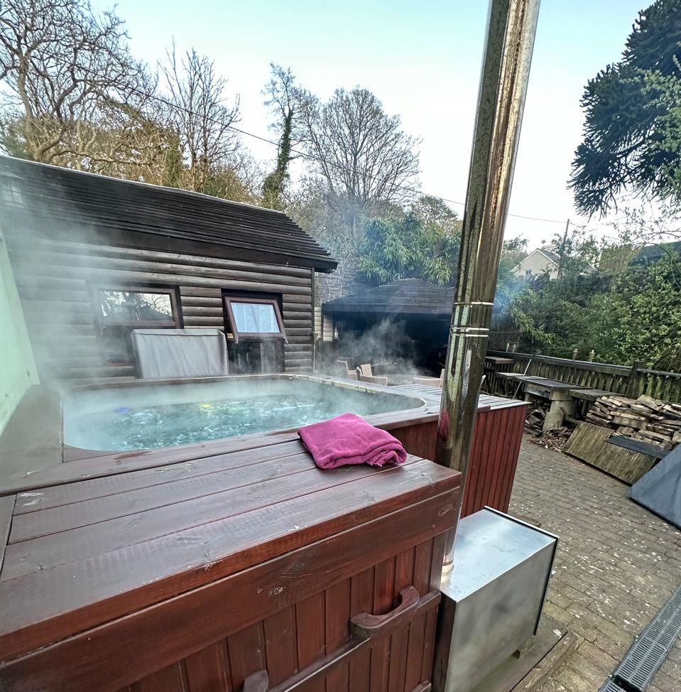 The hot tub by the waterfall     (fully inclusive)