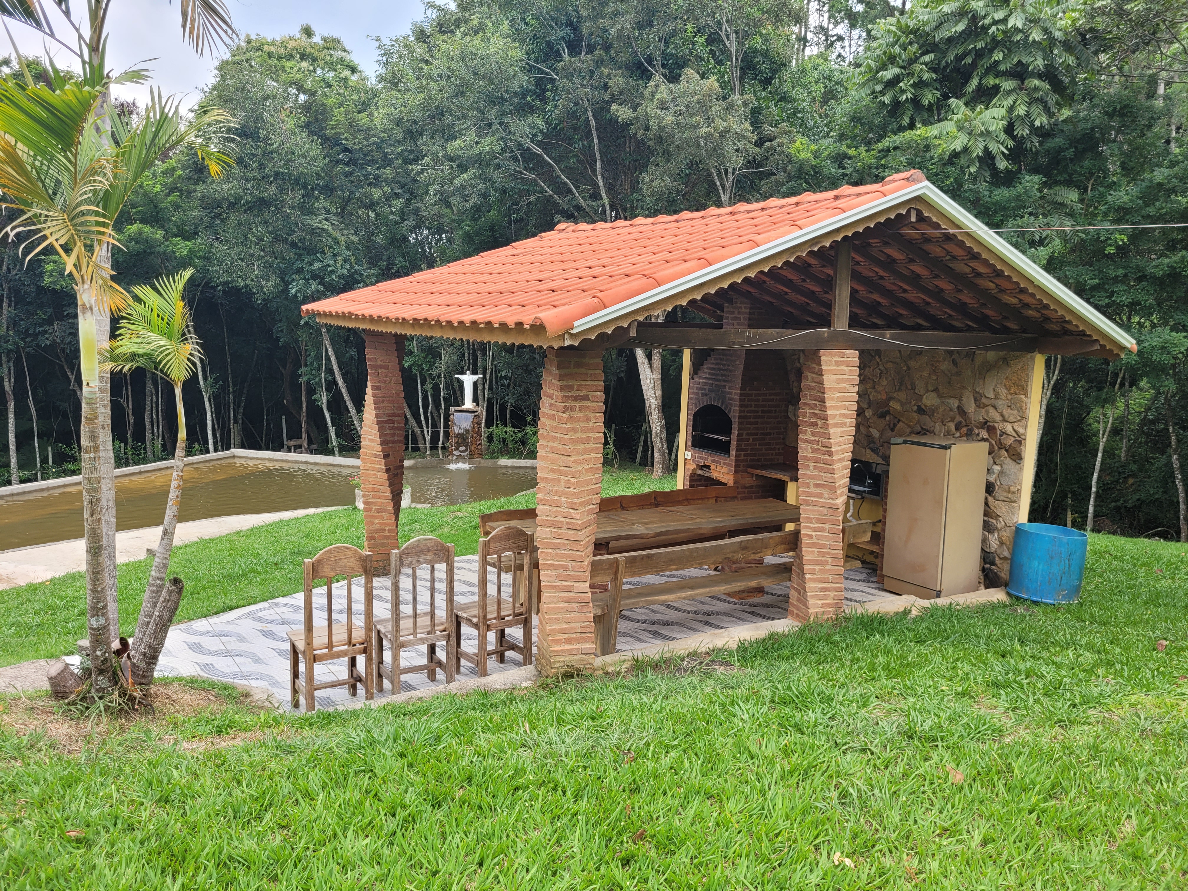Cottage and pool with waterfall water