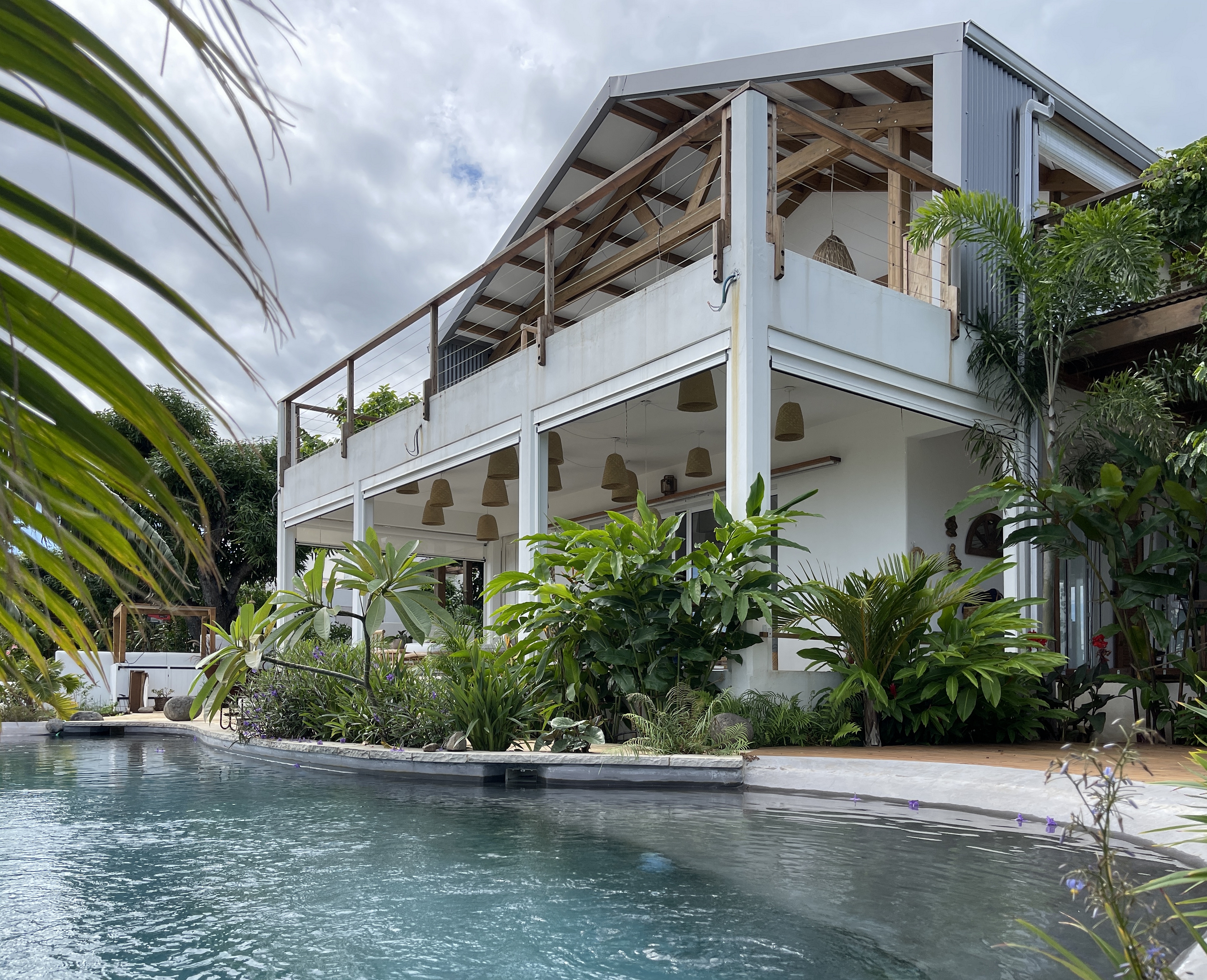 Apartment with pool in tropical garden