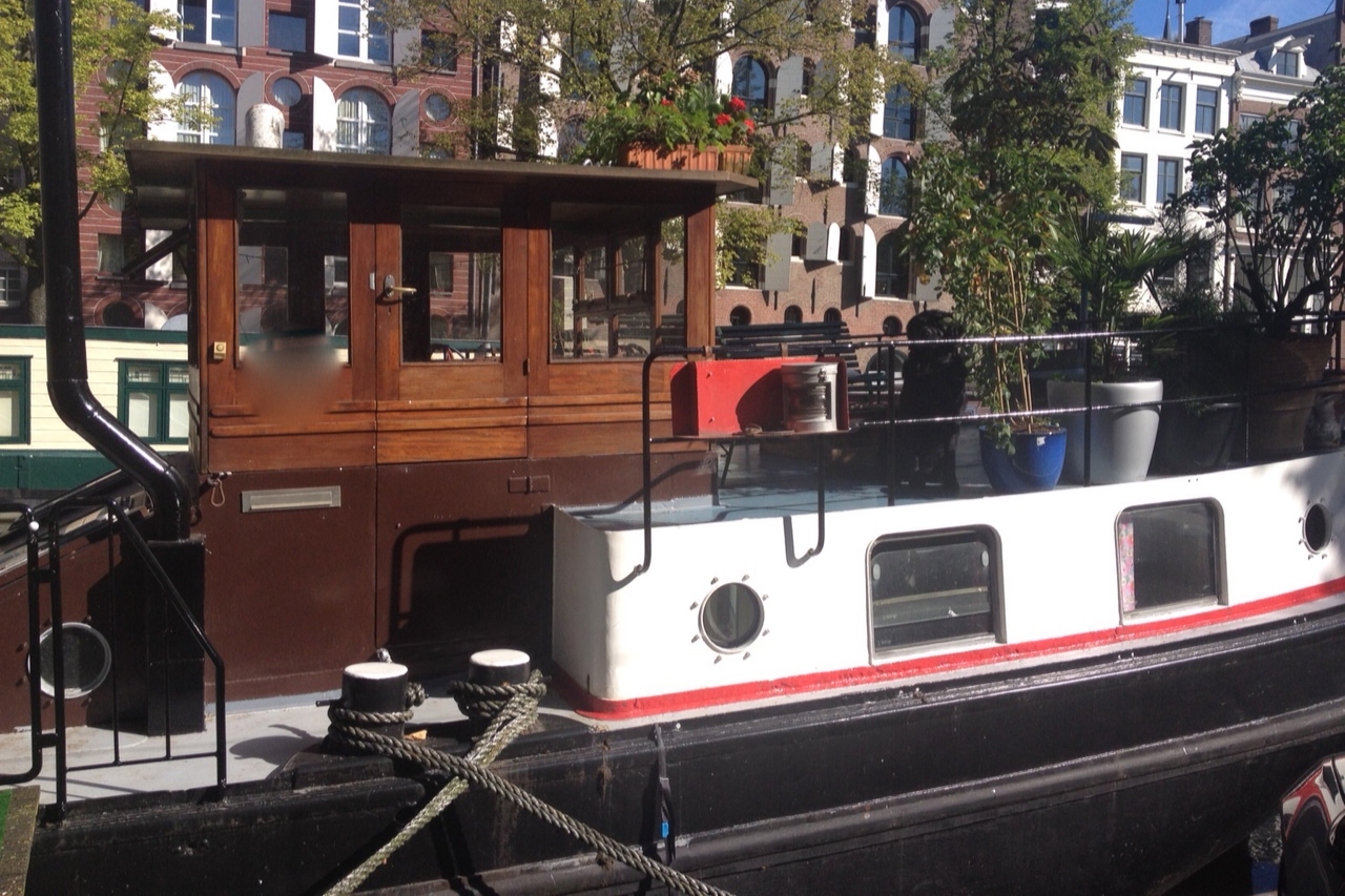 Captain's quarters in classic ship. — Amsterdam stay