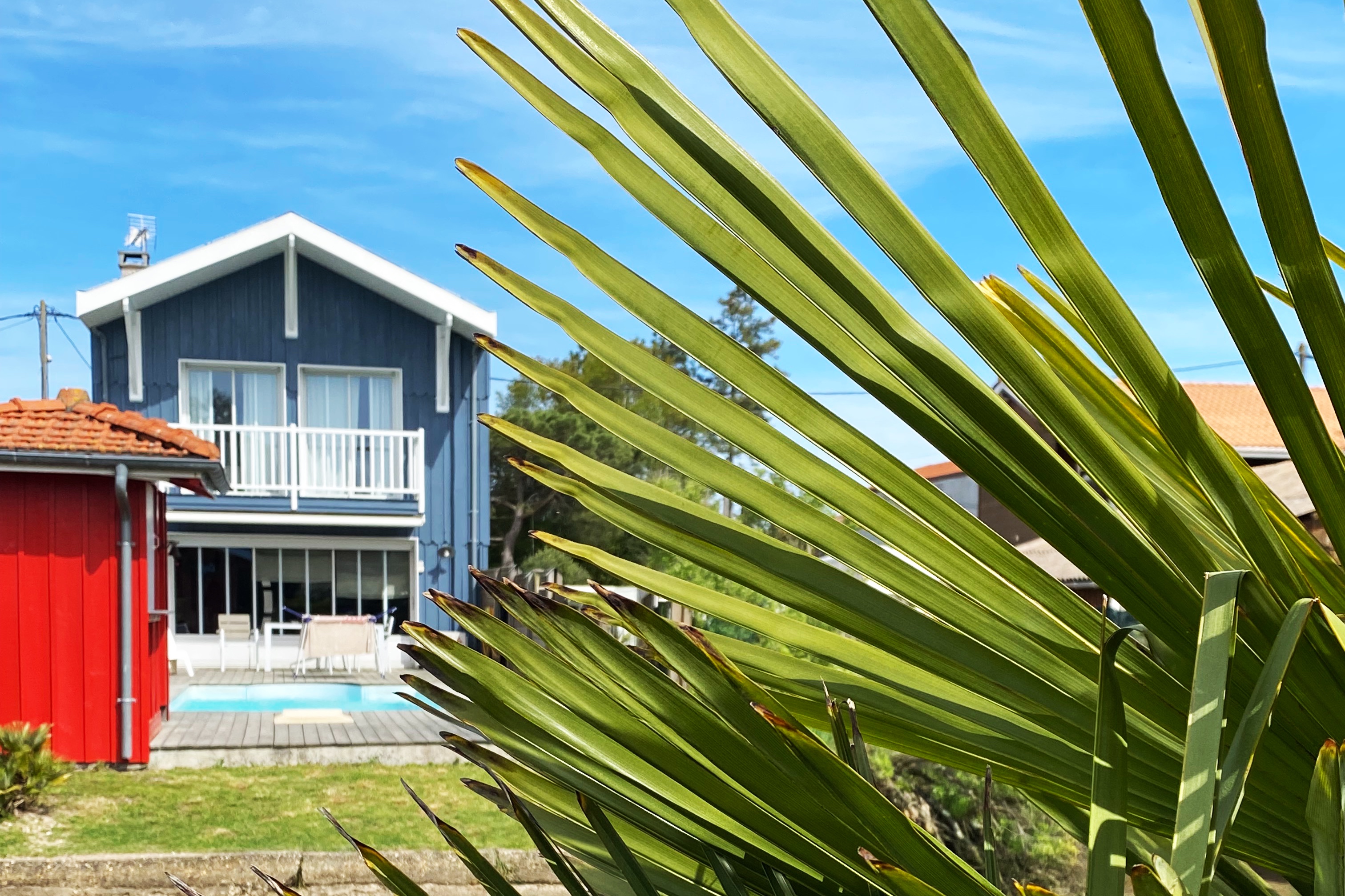 Typical house with a pool by the water