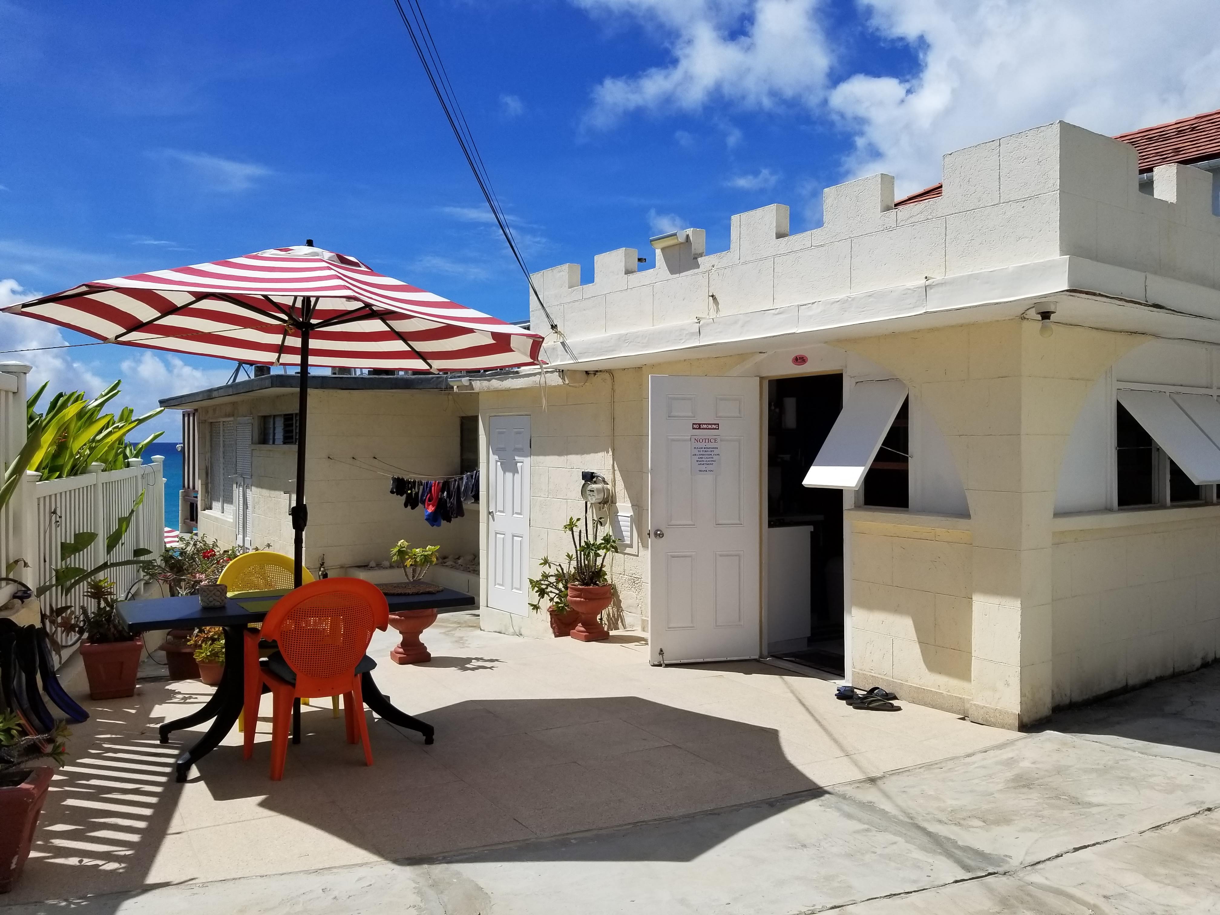 Cotton House 1, Apt 2. On Freight's Bay Beach. Flats for Rent in