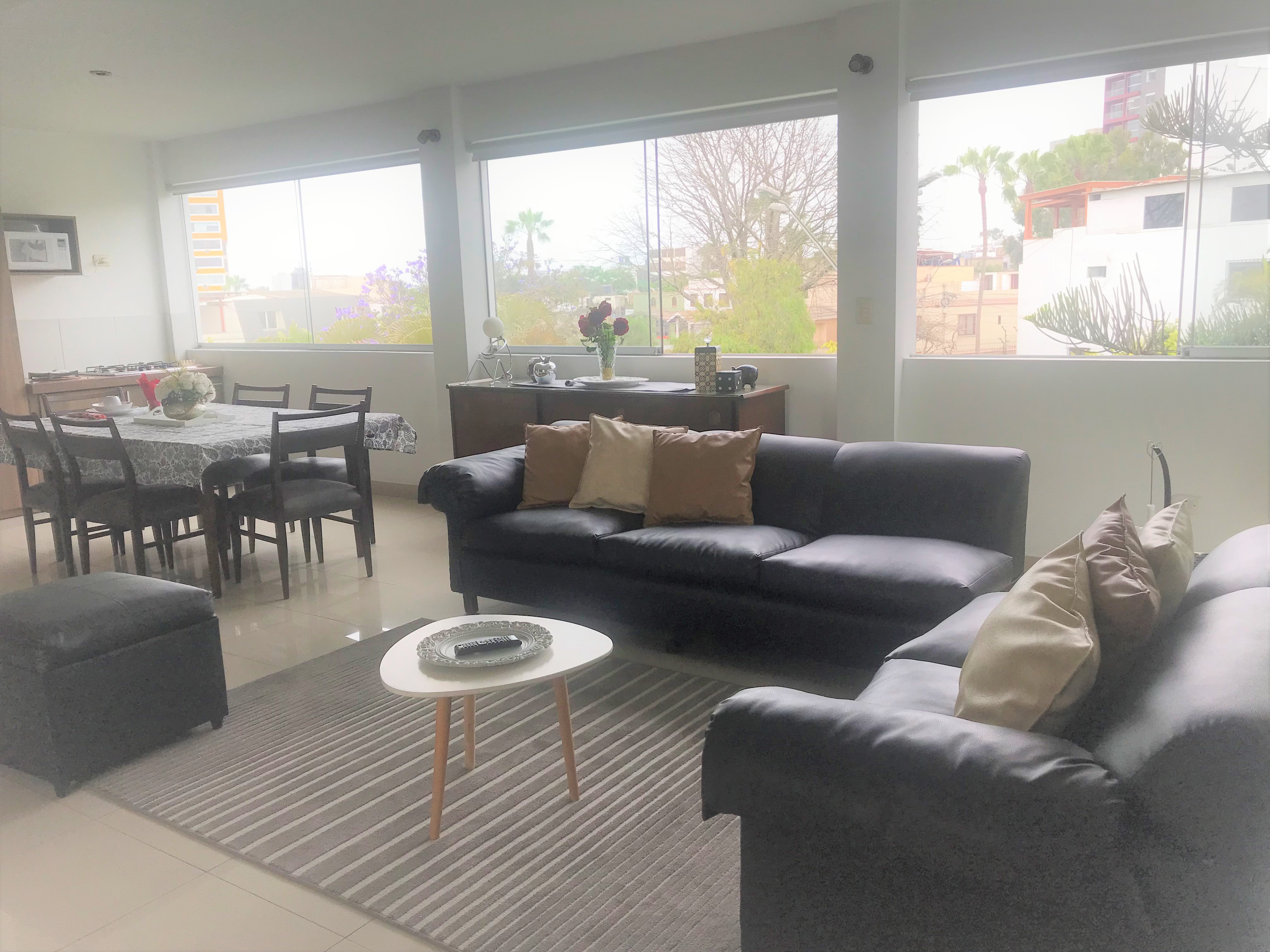 Spacious bright loft equipped with park views.