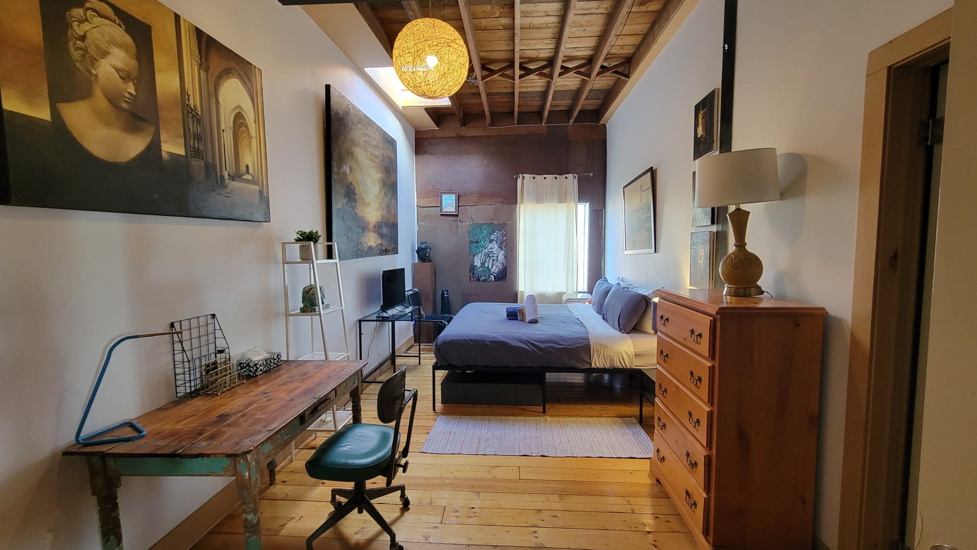 Large eclectic room in a Shared loft in Little Portugal, Toronto