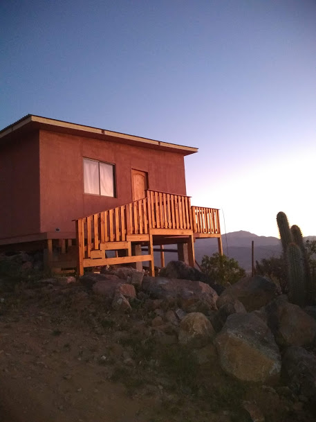 Equipped cabin in front of Mamalluca Observatory.