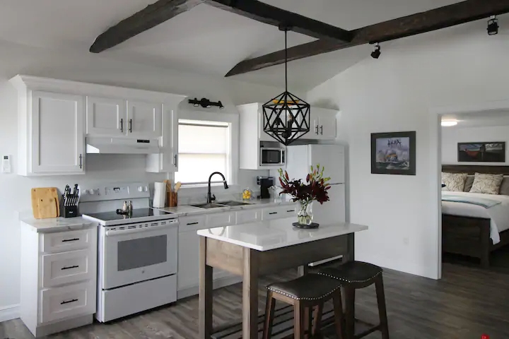 Ship's Wheel with harbour view