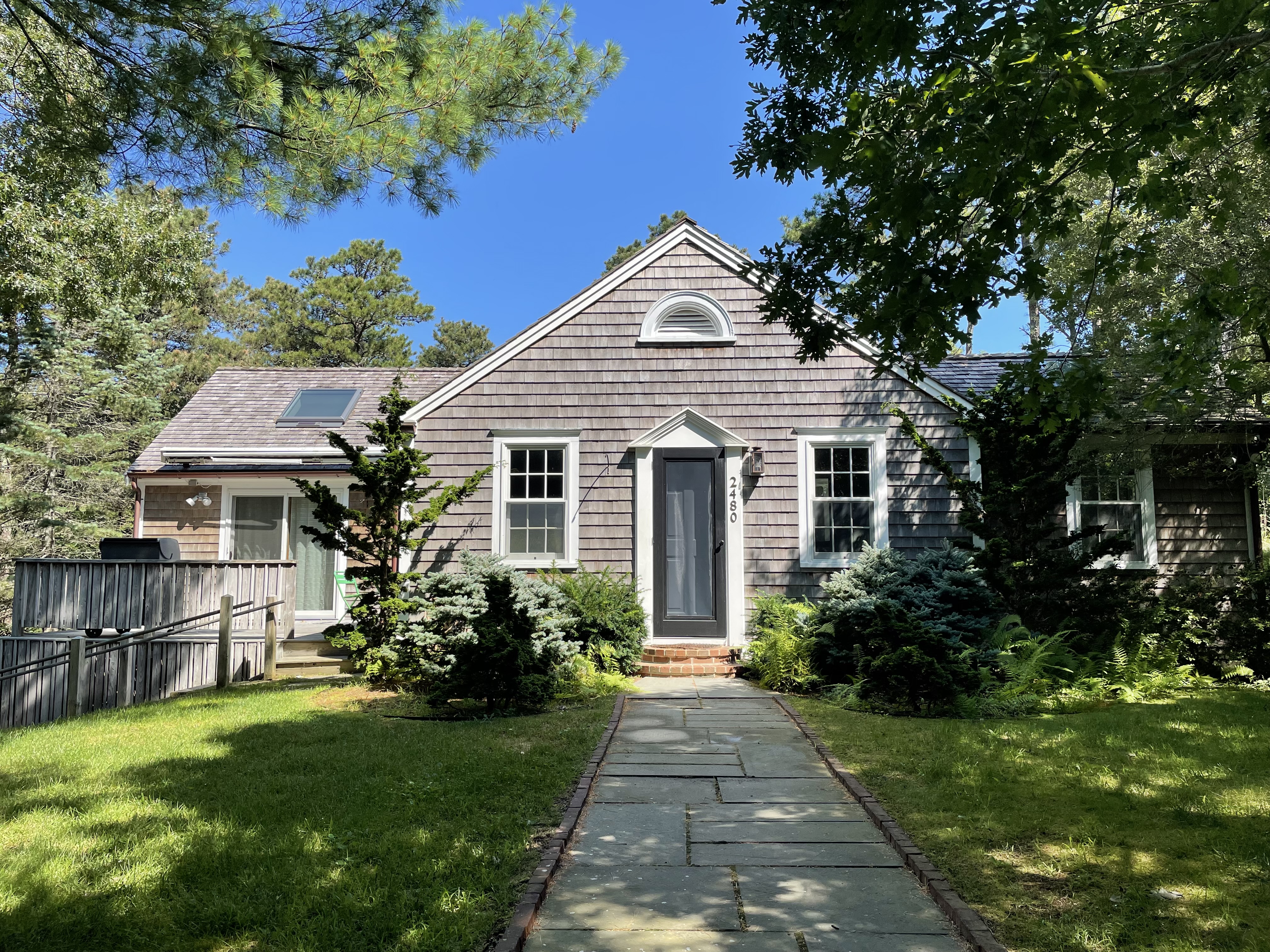 Wellfleet home tucked in 1.5 acres of lush gardens