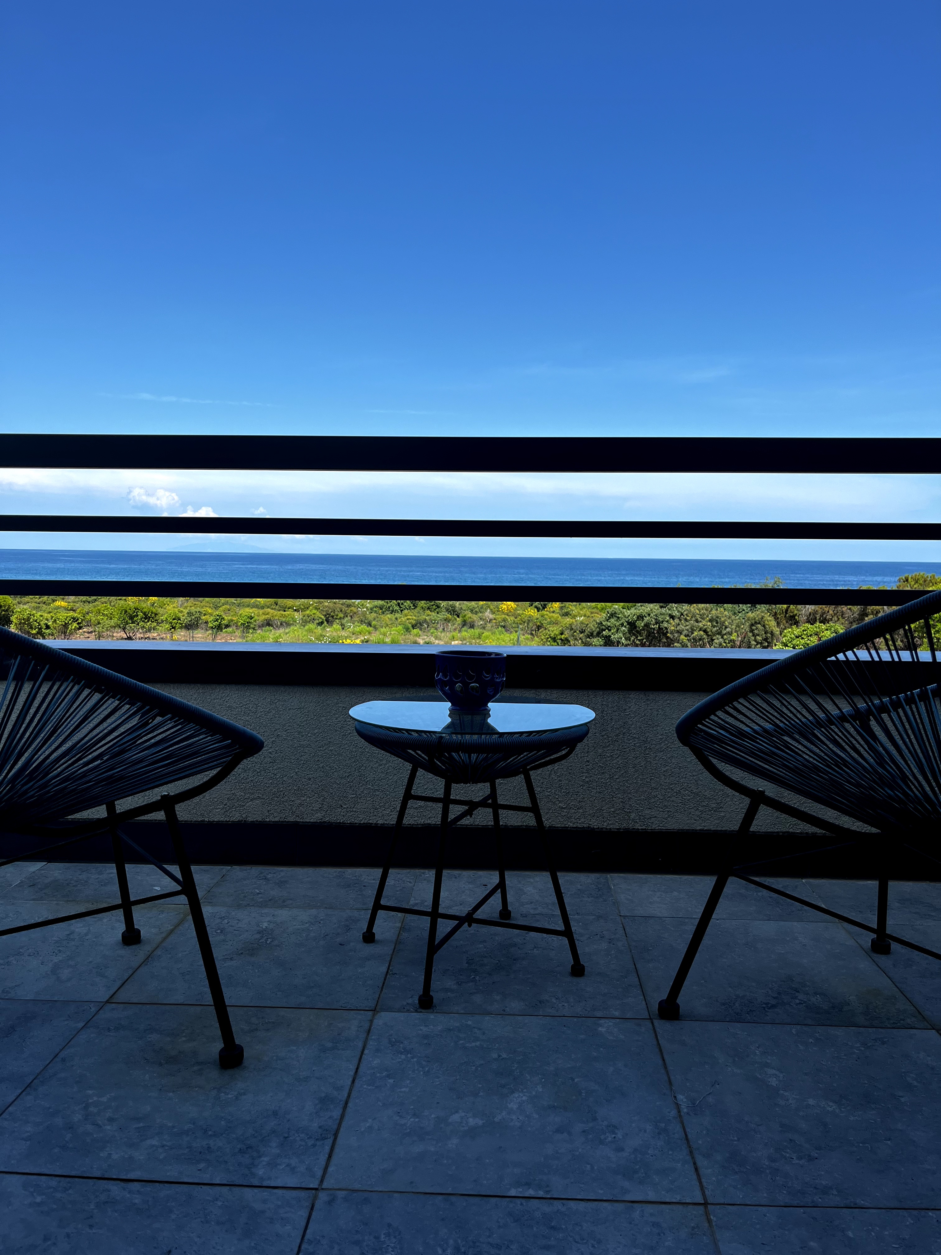 At the water's edge: sea and swimming pool