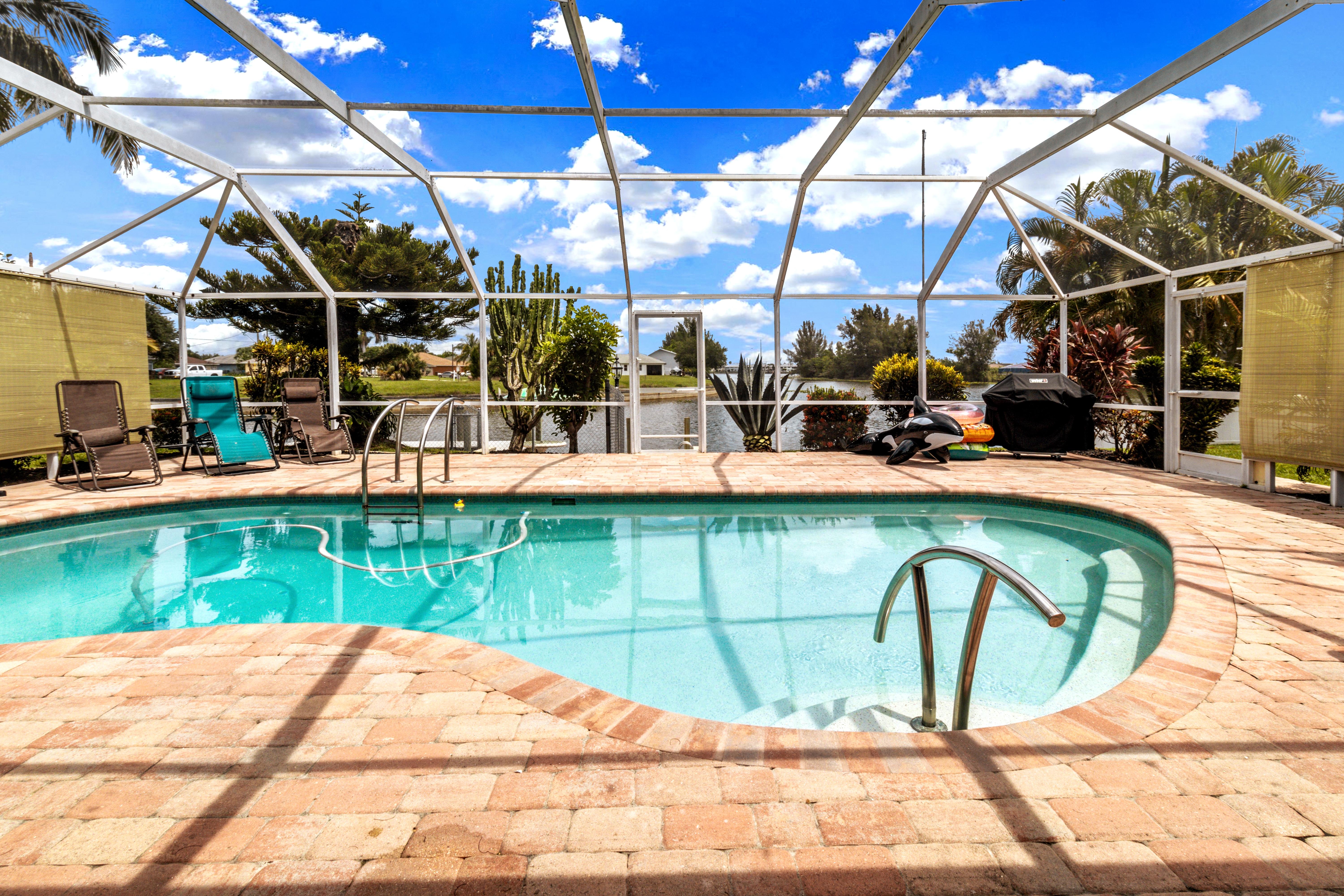 Lake Kennedy waterfront villa w/ pool & lake view.