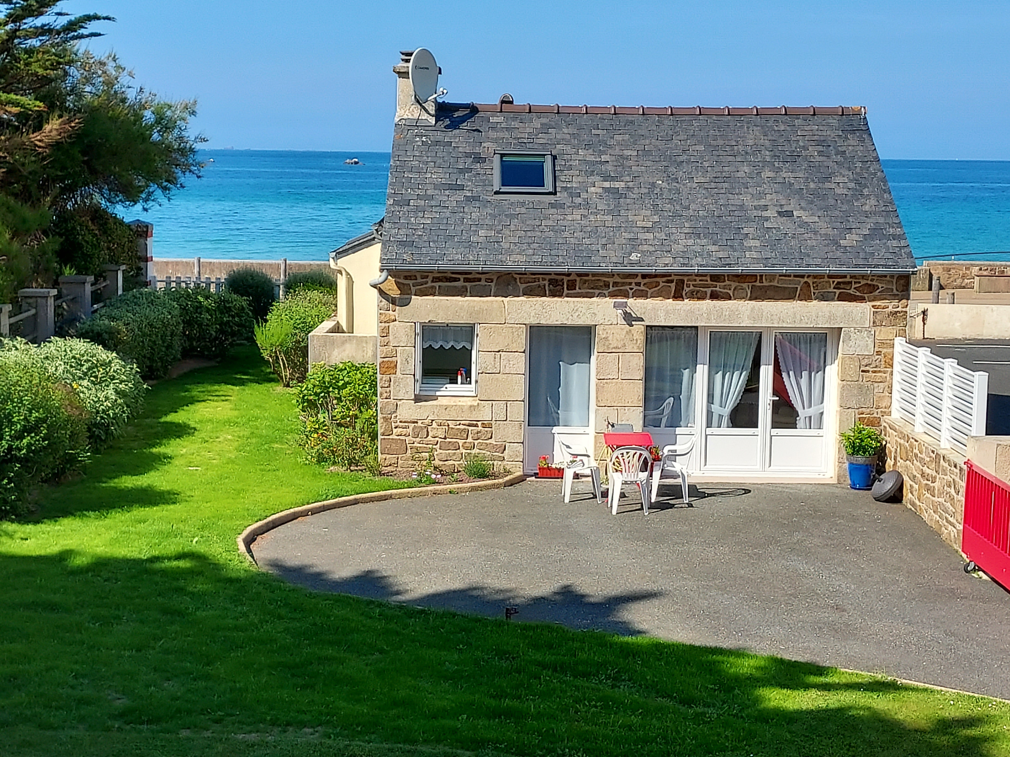 Small Breton house on  large beach