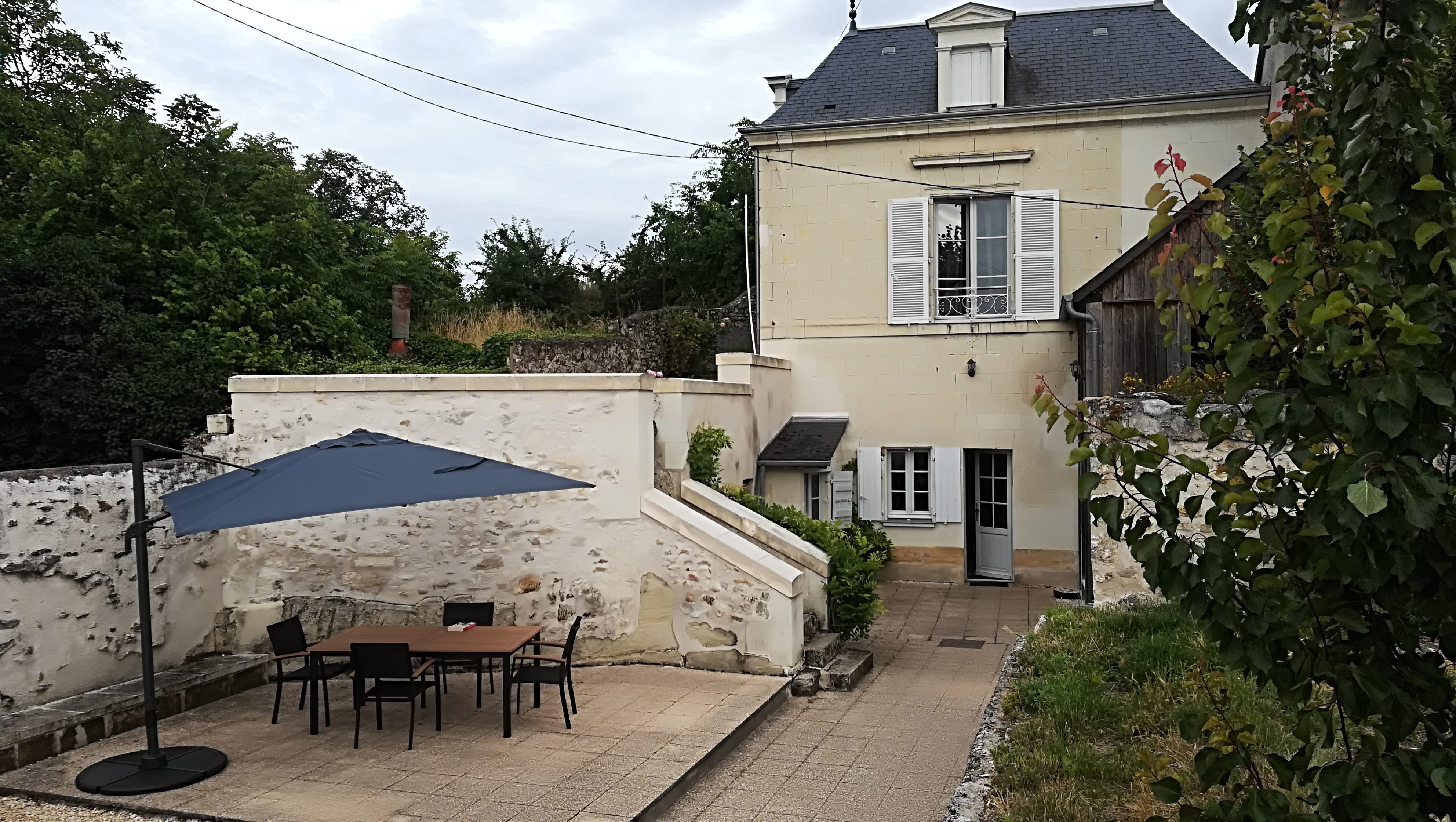Atypical semi-troglodyte house