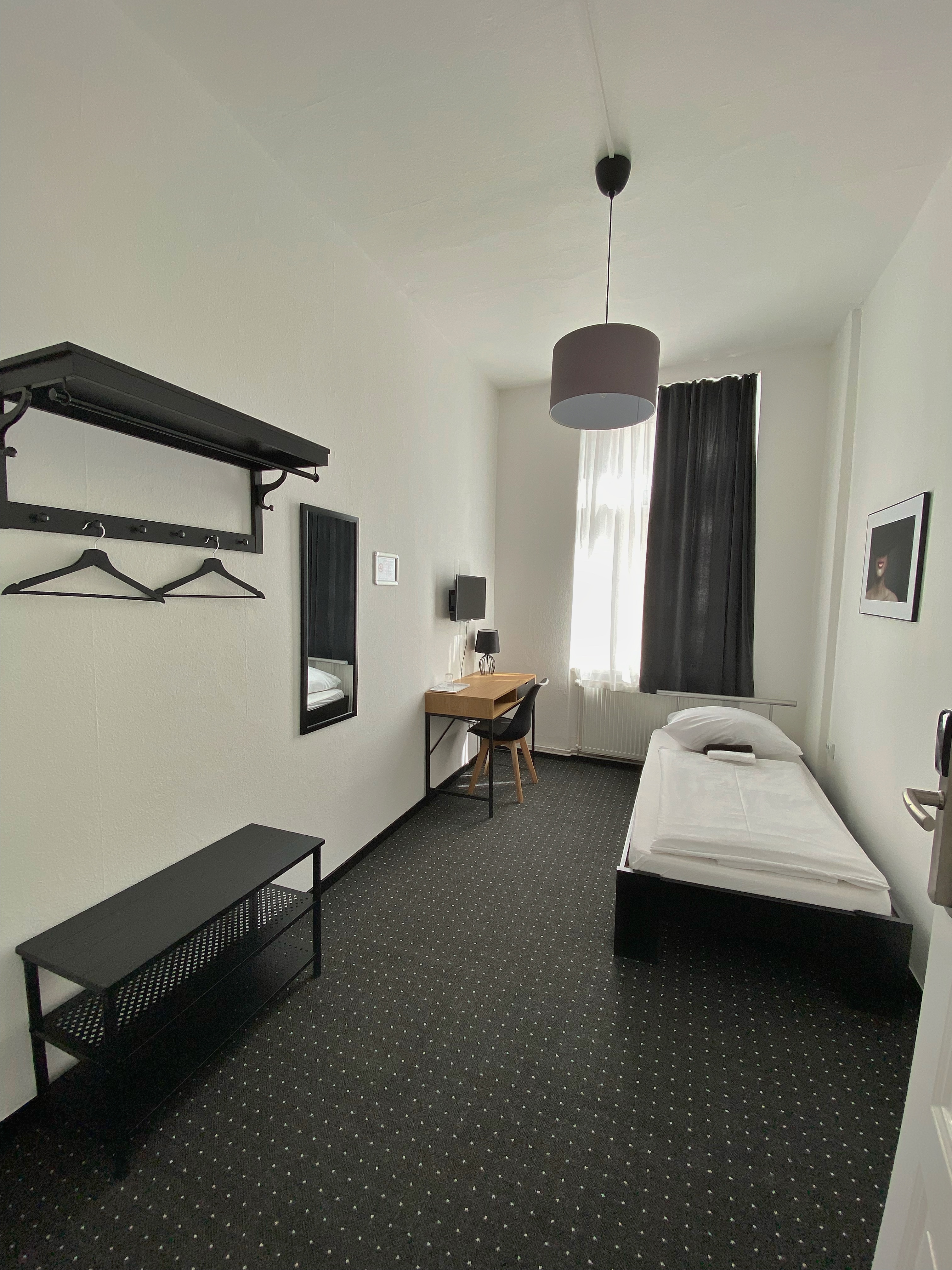 Single room with shared bathroom
