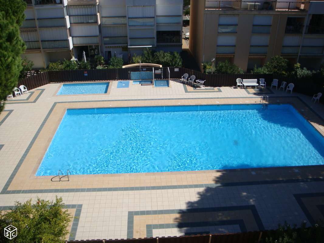 Condominium with a pool