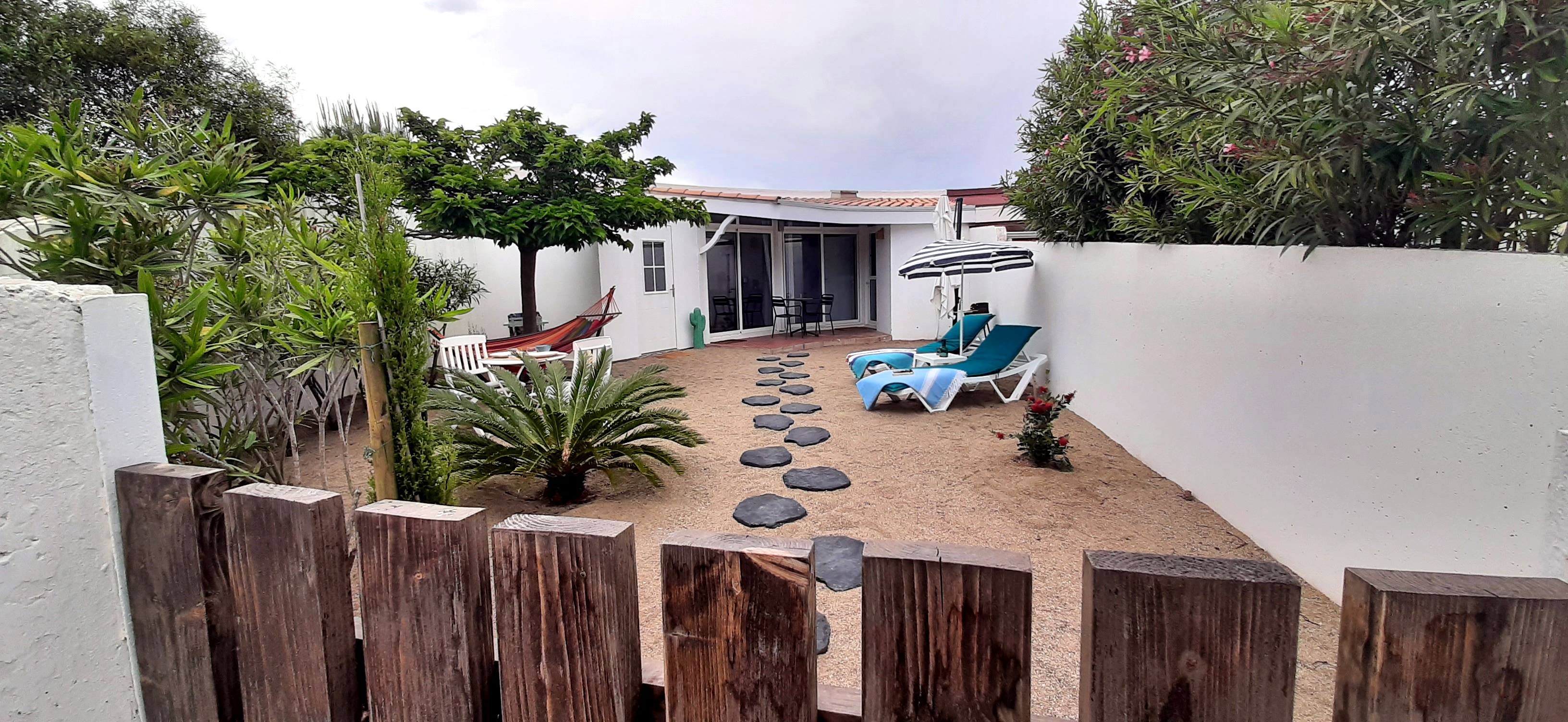 Unique setting just steps from the sea.