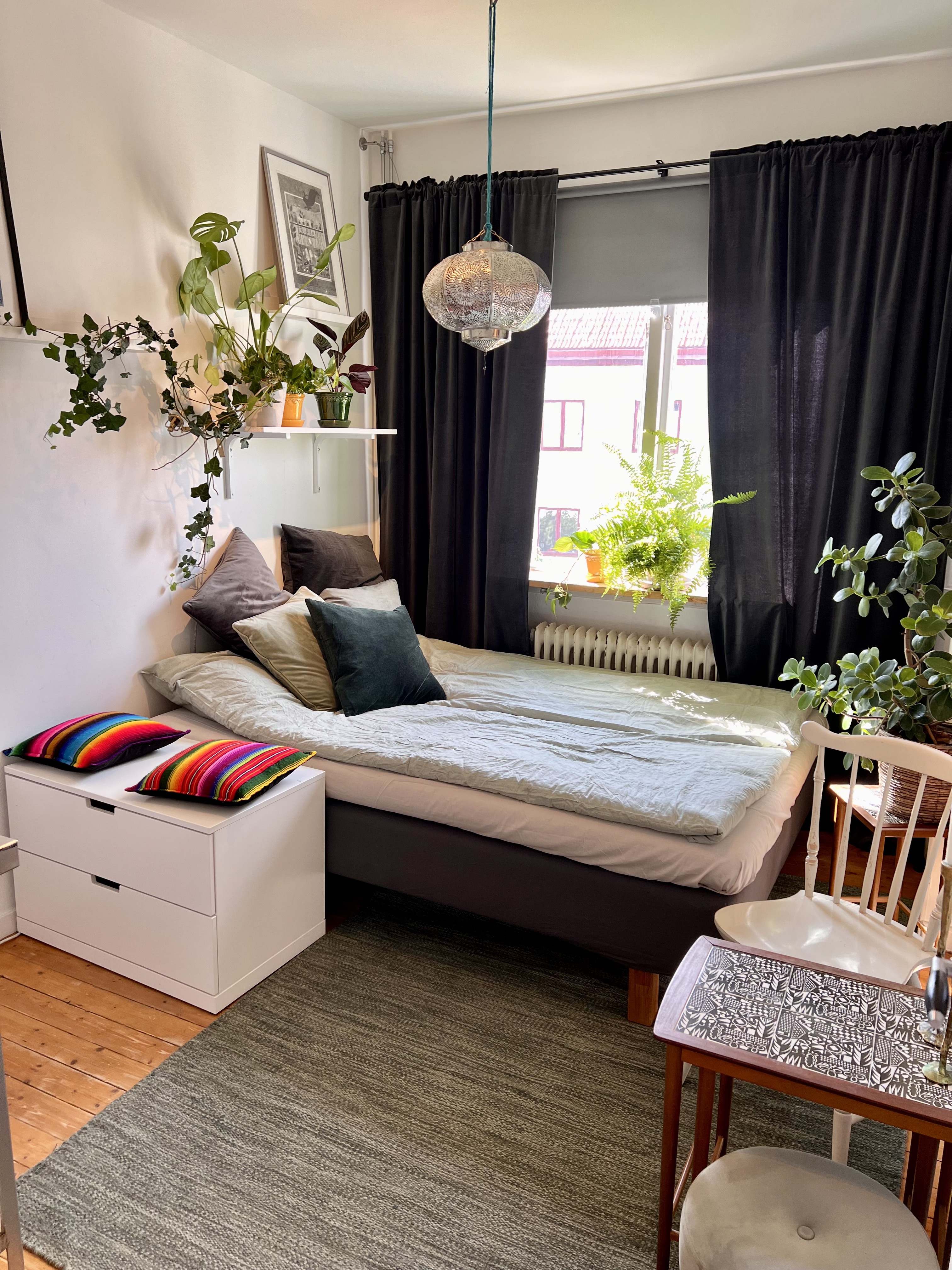 Charming room with lush courtyard.