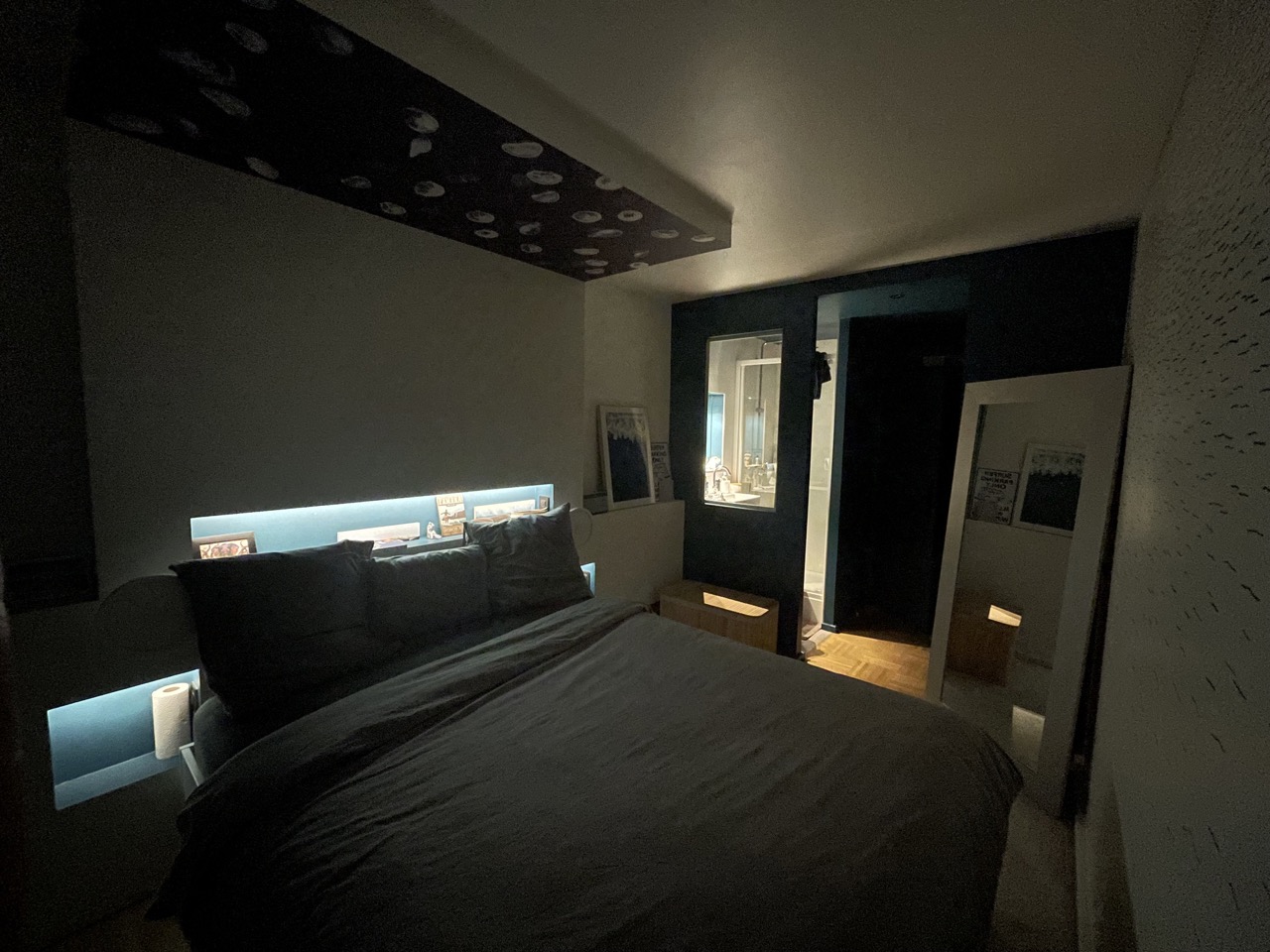 Bedroom with large double bed & shower room