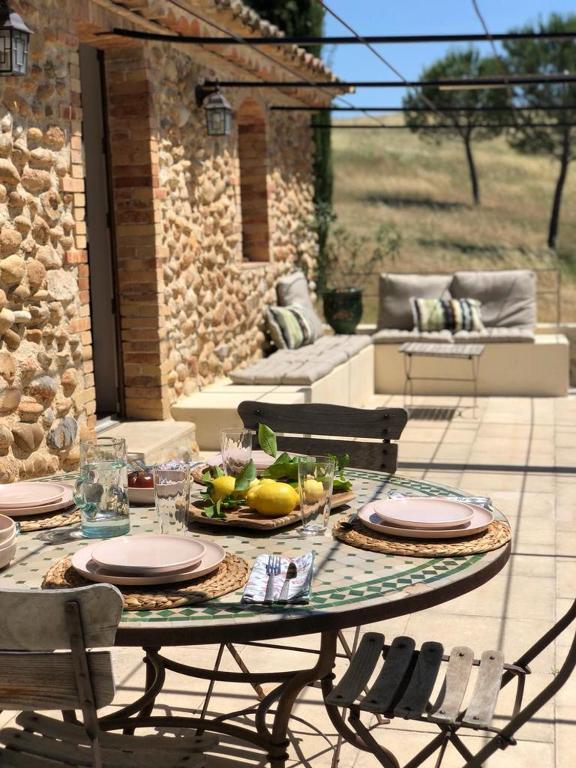 Small stone farmhouse surrounded by nature