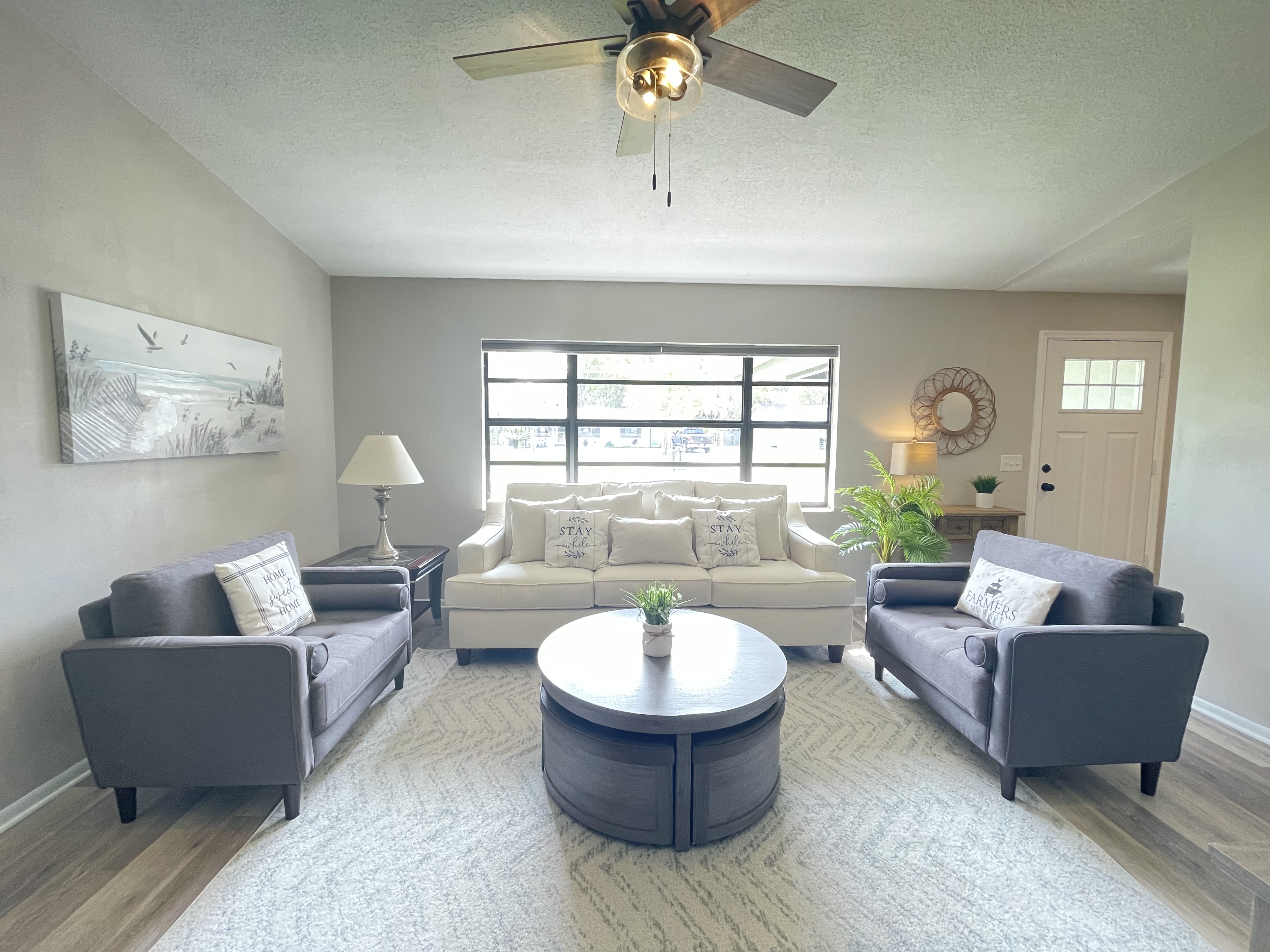Stunning home with screened patio & fenced yard