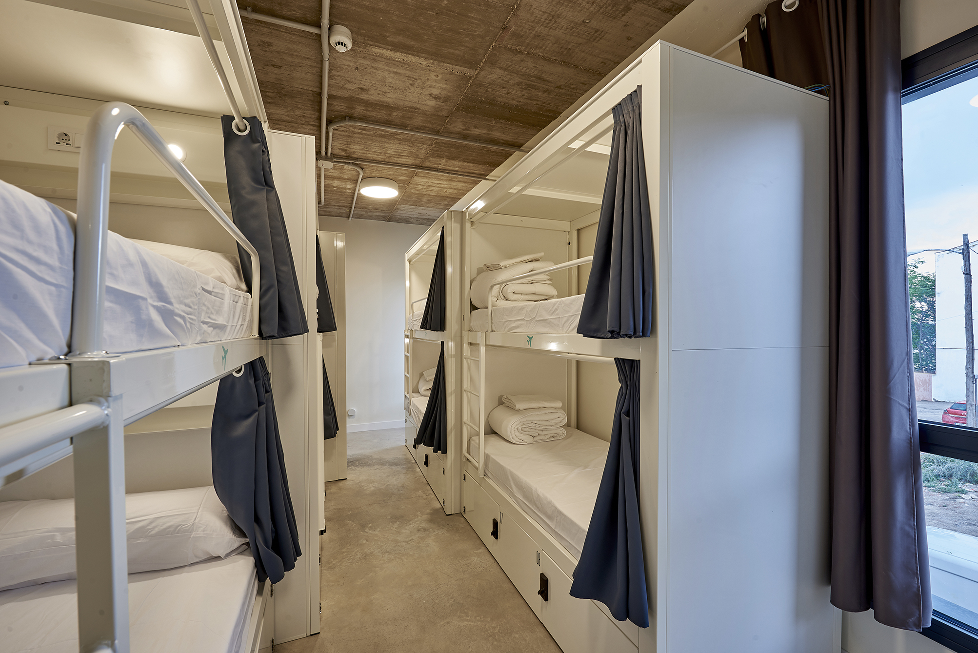Hostelfly. Cama en Habitación mixta 10 pax