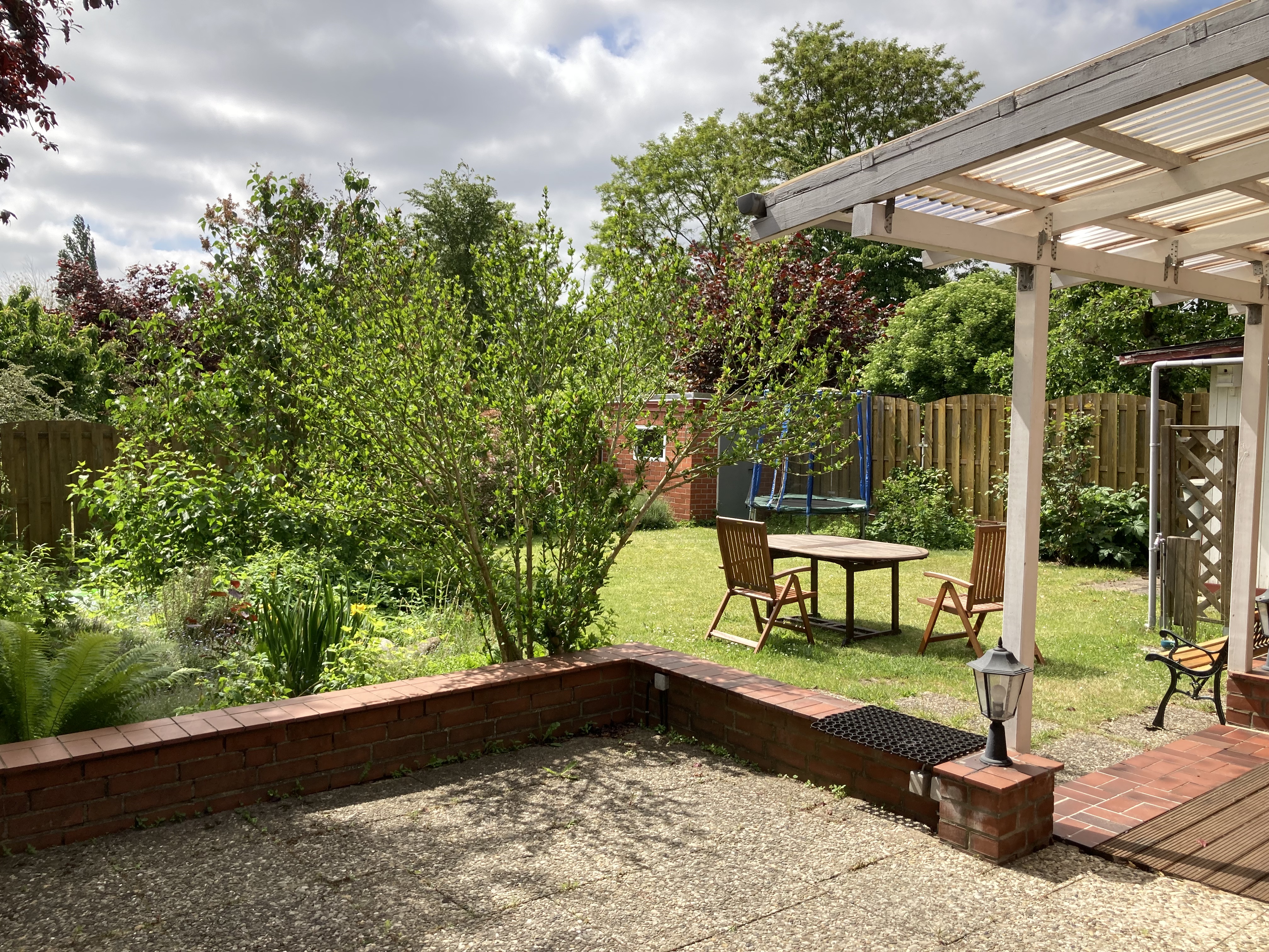 House with private garden, center