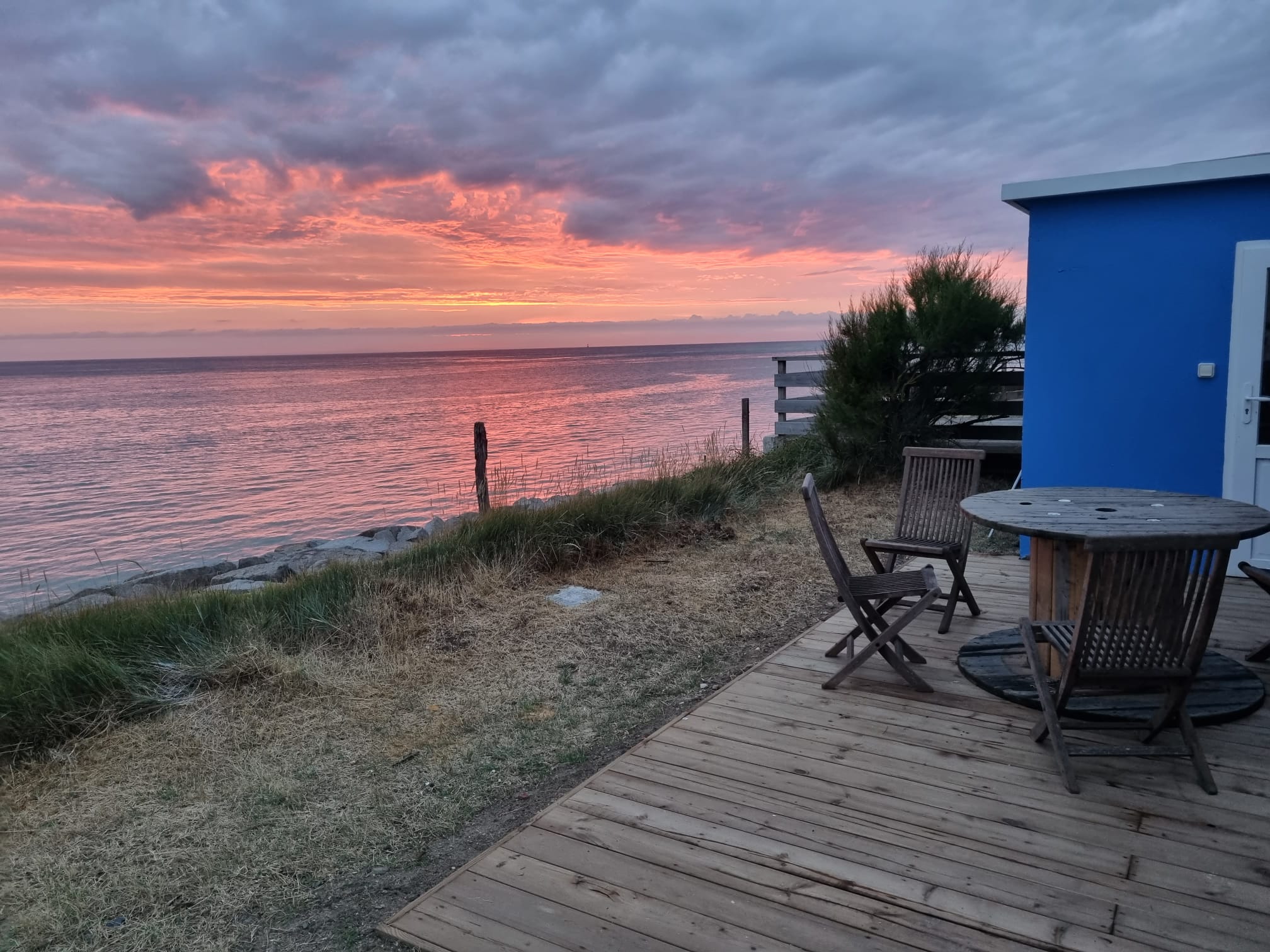 Small house with garden facing sea