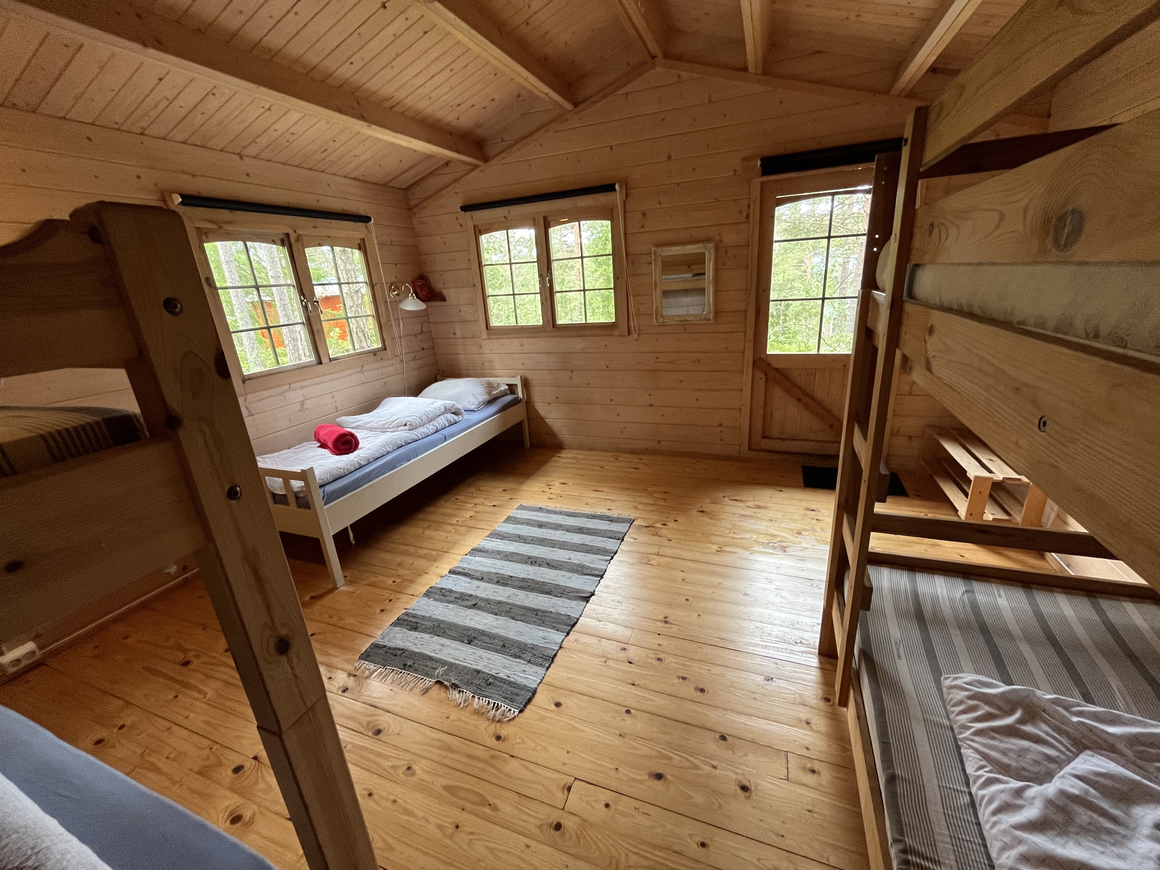 Cozy cottage in the forest near water