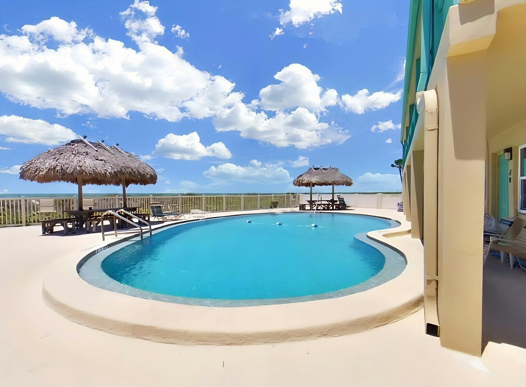 Breezy 1BR 2nd-Floor | Deck | Pool |