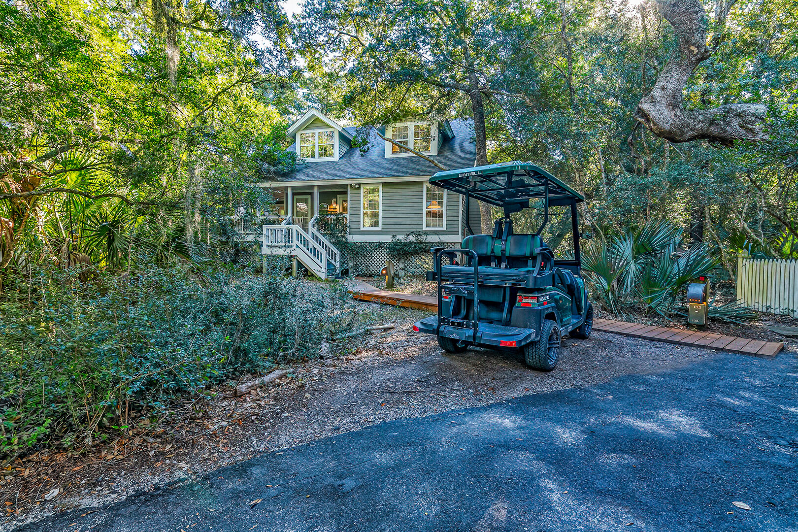New golf cart and tastefully decorated home!