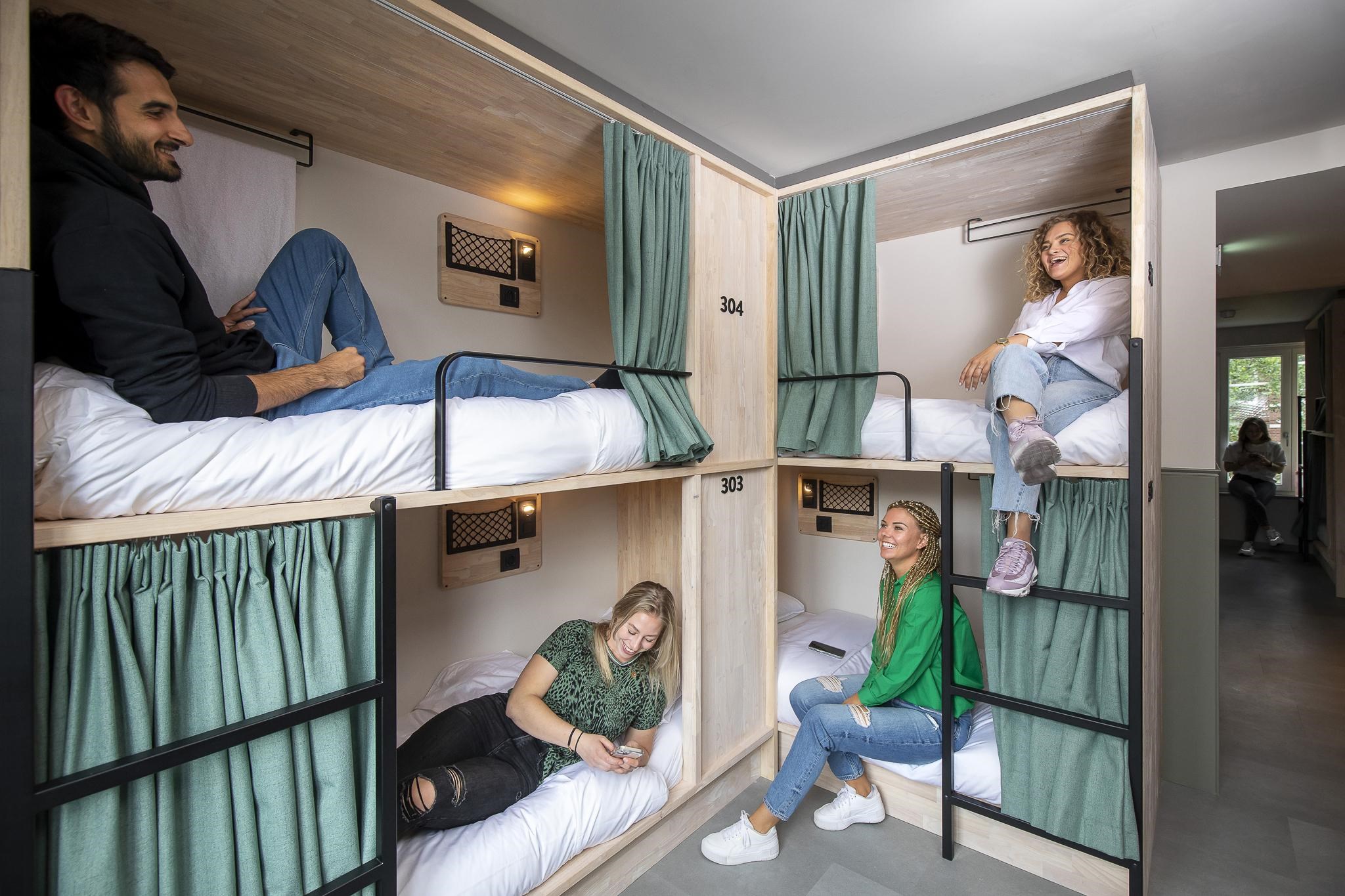 Bed in unisex dorm.