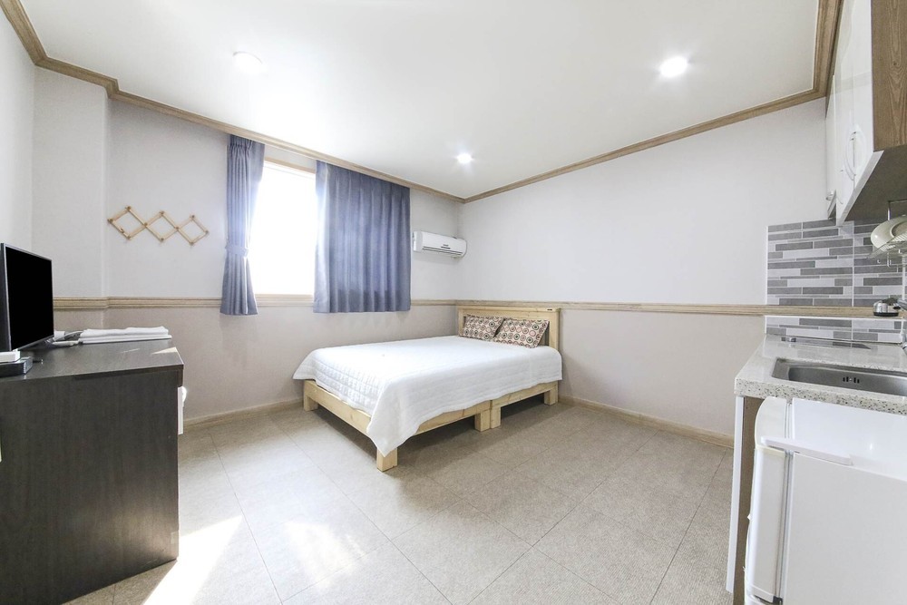 Resort type family pension couple bed representing Daecheon Beach